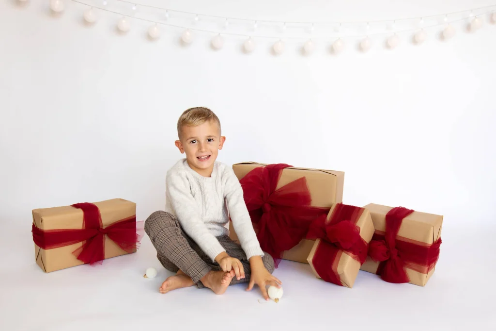 Fotos de niños en un estudio fotográfico de Navidad en Manresa.